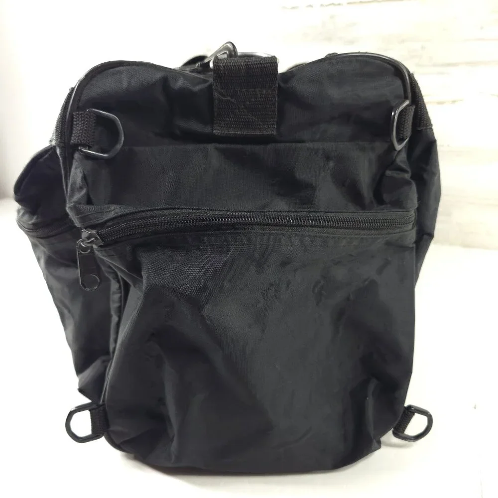 VINTAGE HARLEY DAVIDSON AN AMERICAN LEGEND BLACK DUFFLE BAG WITH SHOULDER STRAP.